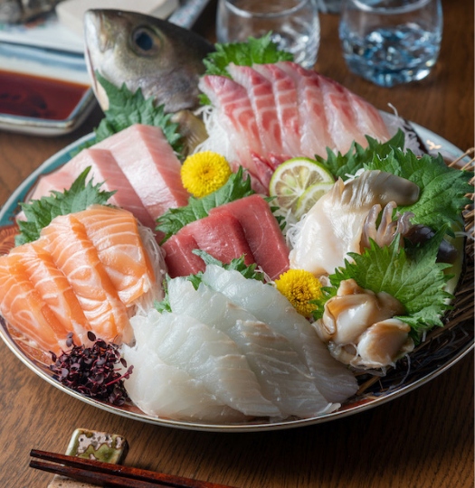 Colorful sashimi platter representing JFC's foodservice reach